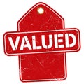 Red tag with valued text symbolizing importance and worth Royalty Free Stock Photo