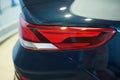 Red tail lights of blue car closeup Royalty Free Stock Photo