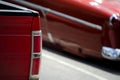 Red taillights o fared truck and red classic car Royalty Free Stock Photo