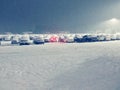 Red taillights in snow covered parking lot Royalty Free Stock Photo