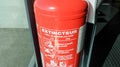 Red tank of fire extinguisher. Fire extinguishing system Royalty Free Stock Photo