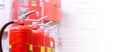 Red tank of fire extinguisher Overview of a powerful industrial fire extinguishing system Royalty Free Stock Photo
