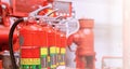Red tank of fire extinguisher Overview of a powerful industrial fire extinguishing system Royalty Free Stock Photo