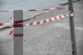 Red tape on wooden posts, soft focus Royalty Free Stock Photo