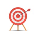 Red target with arrow, standing on a tripod. Goal achieve concept. Vector illustration isolated on white background Royalty Free Stock Photo