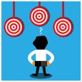 Red target icon and business man. This theme template is showing the concept of confused in achieving goals. Royalty Free Stock Photo