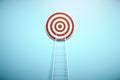 Red target with ladder on blue wall