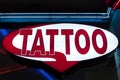 Red Tattoo Sign at Night Royalty Free Stock Photo