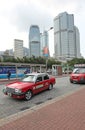 Red taxi and traffic in Hong Kong Royalty Free Stock Photo