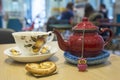 Red teapot and cup of tea Royalty Free Stock Photo