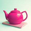 Red teapot over book Royalty Free Stock Photo