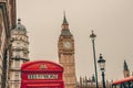 Red telephone booth and Big Ben in London