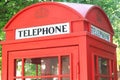 Red telephone booth in classic english style close Royalty Free Stock Photo