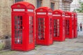 Red telephone booths in Covent Garden street, London, England