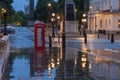 The red telephone box , famous icon of London, on Waterloo place Royalty Free Stock Photo