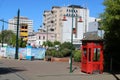 Red telephone box by lamp post, Christchurch, N Z Royalty Free Stock Photo