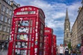 The red telephone box, a popular site around the United Kingdom and seen here at the Royal Mile, was designed by Sir Giles Gilbert Royalty Free Stock Photo