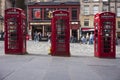 The red telephone box, a popular site around the United Kingdom and seen here at the Royal Mile, was designed by Sir Giles Gilbert Royalty Free Stock Photo