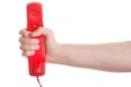 Red telephone receiver in hand Royalty Free Stock Photo