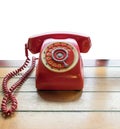 Red telephone vintage old style on table Royalty Free Stock Photo
