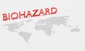 Red text `BIOHAZARD` placed above world map. Concept art of pandemic situation of coronavirus 2019-nvoc, COVID-19, SARS-COV-2. Royalty Free Stock Photo