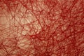 Red textural background of interwoven string Royalty Free Stock Photo