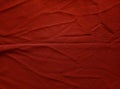 Red texture cloth background. Matted and striped surface