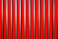 A Vertical Red texture with grey corrugation generated by ai