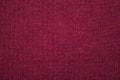 Red texture woolen knitted fabric as background Royalty Free Stock Photo