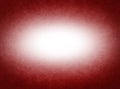 Red textured background with subtle grain and smooth vignette effect. Soft light center with darker edges. Abstract Royalty Free Stock Photo