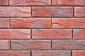 Red textured bricks close-up, brick wall Royalty Free Stock Photo