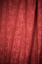 the red textured curtain background close up