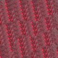 Red textured patterns in the form of a braid. Royalty Free Stock Photo
