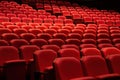 Rows of red generic theater seat