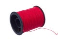 Red thread on black plastic spool Royalty Free Stock Photo