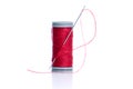 Red thread bobbin and needle Royalty Free Stock Photo
