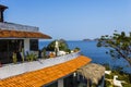 Red tile roof of resort along the shoreline of Ixtapa Bay in Mexico. Royalty Free Stock Photo