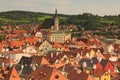 Red tile roofs cityscape. Church of Saint Vitus- UNESCO World Heritage Site. Summer sunny day. Cesky Krumlov Krumau