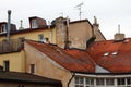 Red tiled roofs, the walls of houses and chimneys Royalty Free Stock Photo