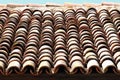 Red tiles roof background. Background of old roof tiles. Royalty Free Stock Photo