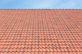 Red tiles roof background and blue sky Royalty Free Stock Photo