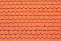 Red tiles on the roof, textured background for design. Old clay roof texture Royalty Free Stock Photo