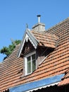 Red tiles roof and window Royalty Free Stock Photo