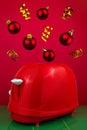 Red toaster flying golden confetti ribbon Christmas balls green tile Breakfast food cooking concept. Levitation creative