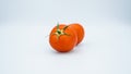 Red tomato against white background Royalty Free Stock Photo