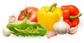 Red tomato, bell peppers, green salad and garlic with cloves Royalty Free Stock Photo