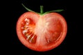 The red tomato cut half-and-half. Royalty Free Stock Photo