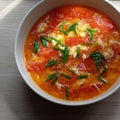 Red tomato with egg soup bowl, simple, cheap and quick food for lunch Royalty Free Stock Photo