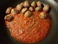 Red tomato pasta sauce and meatballs in skillet or pan Royalty Free Stock Photo