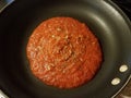Red tomato pasta sauce in skillet or pan Royalty Free Stock Photo